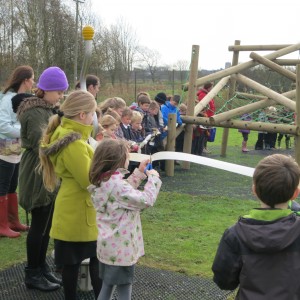 St Michael's school children cutting the ribbon for the bigger equipment